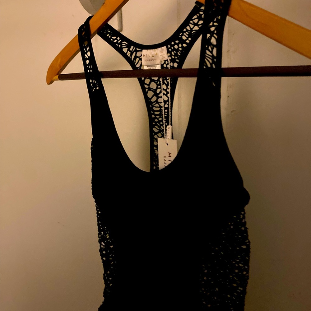 Super classy black, mesh swimsuit! Coverage only where necessary. Eye catching!